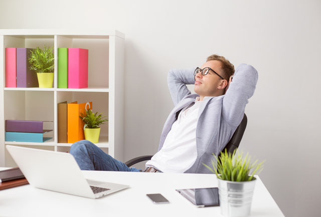 RelaxedAtDesk_shutterstock_259020914